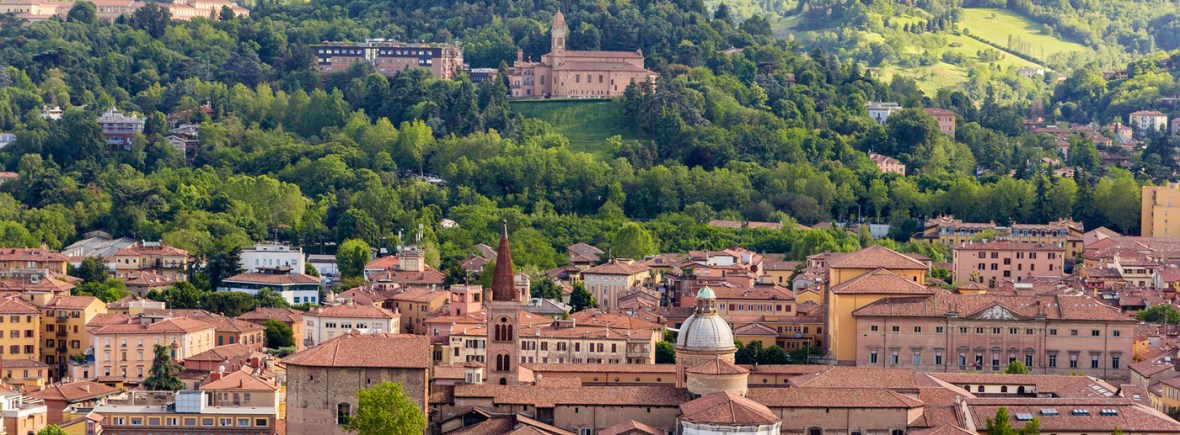 View of Bologna's hills and red roofs from city center